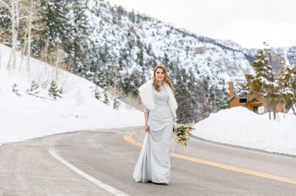Bride walking on the road at Mount Charleston on her wedding day